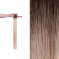 Premium gdollshair extension sample showcasing Skinny Ice with silky smooth texture for flawless hair transformations.